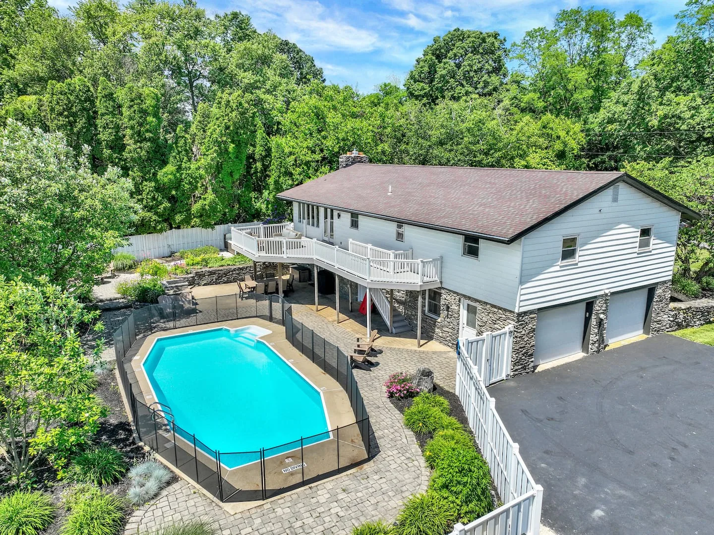 Aerial view of the Lancaster Retreat house, pool and deck